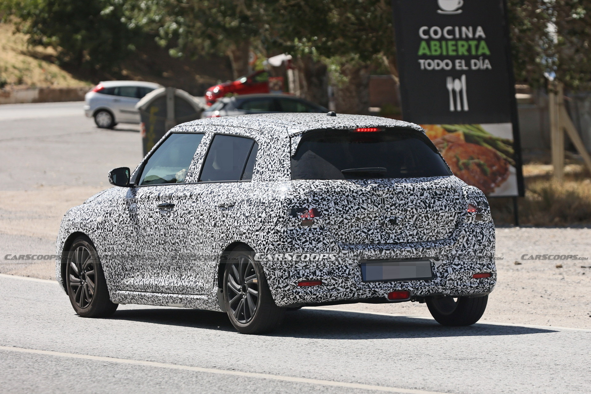 Suzuki Swift Makes Spy Debut Showing Evolutionary Styling Carscoops