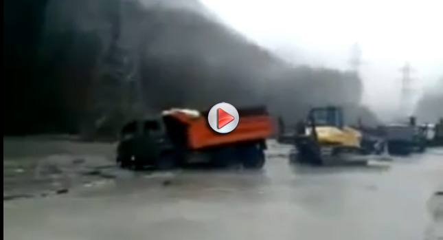  FAIL: Dump Truck Goes Underwater, Driver Narrowly Escapes [Video]