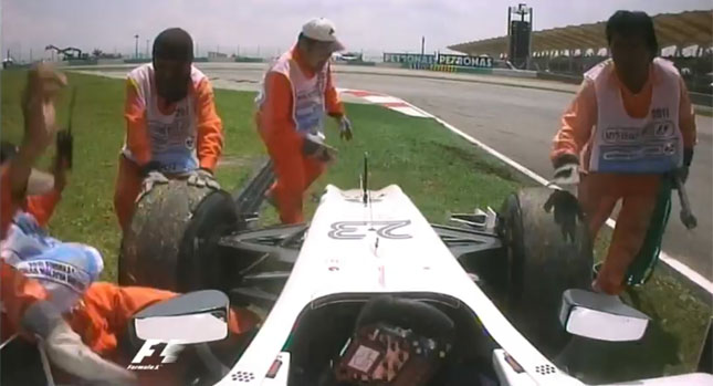  Oops Moment: Vitantonio Liuzzi Runs over F1 Marshal [Video]