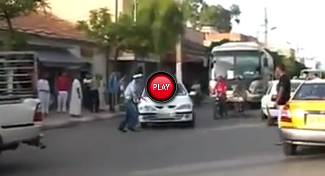  Algerian Driver Won't Stop Even when the Police Officer Jumps on the Hood