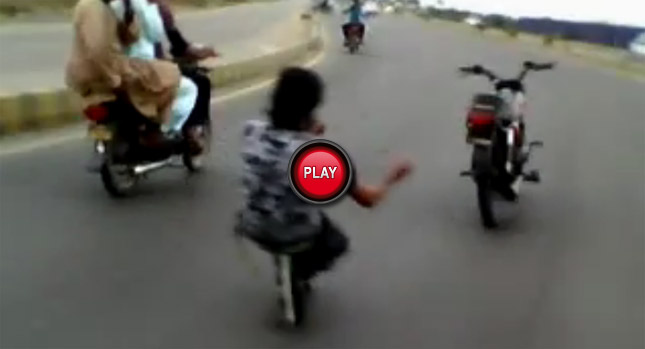  Dancing with the Bikes: Pakistani Rollerblader Controls Motorcycle with Ropes from Behind