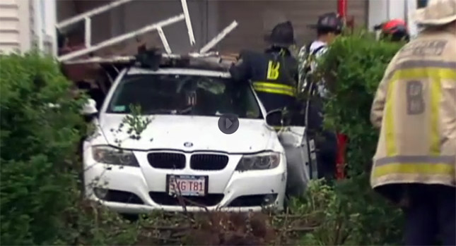  8-Year Old Boy Plays in Mom's New BMW, Ends Up Crashing a House