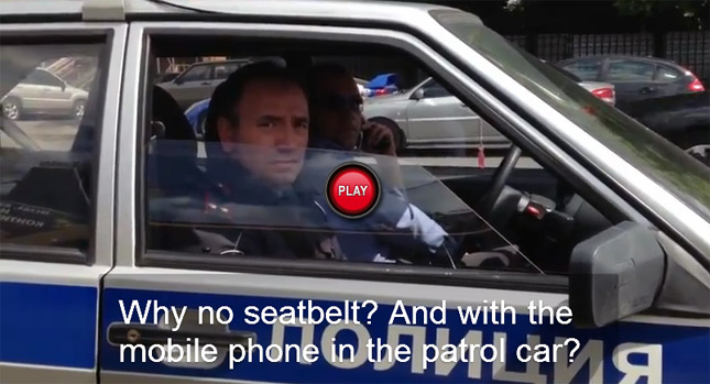  Russian Driver Scolds Cops for Not Wearing Seat Belts and Talking on the Phone