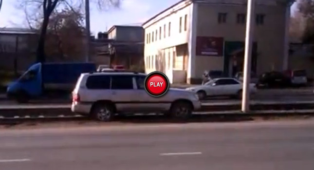  Toyota Land Cruiser Tries to Avoid Traffic Only to Get Stuck on the Train Rails