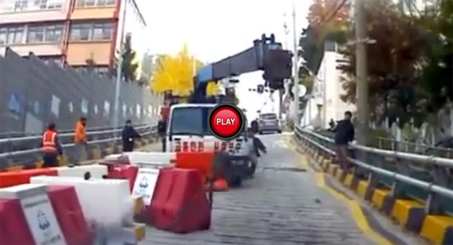  Korean Driver Acts Swiftly when Confronted by a Large Truck Rolling Down the Road