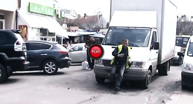  Parking Attendant Pushed by Truck Driver