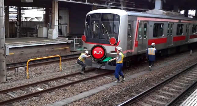  Oh, Tokyo: This Guy Thinks He Can Stop a Train with His Hands