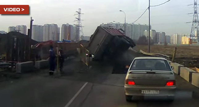  Road Collapses Overturning a Dump Truck on a Dodge, Yet Driver Makes it Out Alive