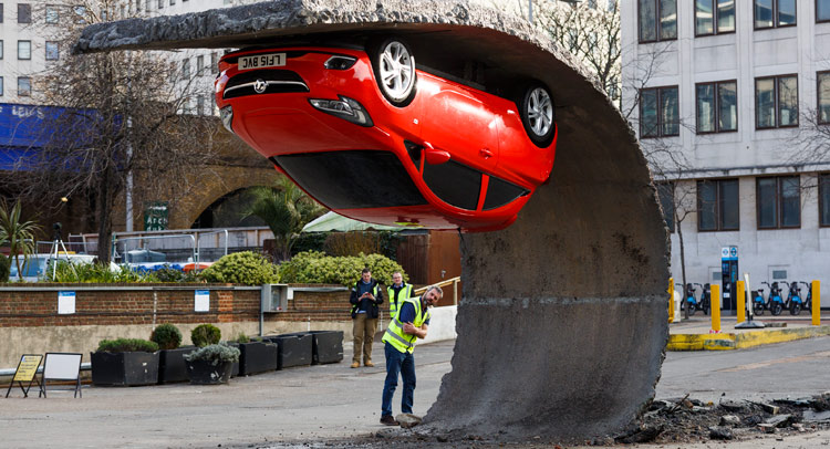  Artist Hangs New Opel/Vauxhall Upside Down in London