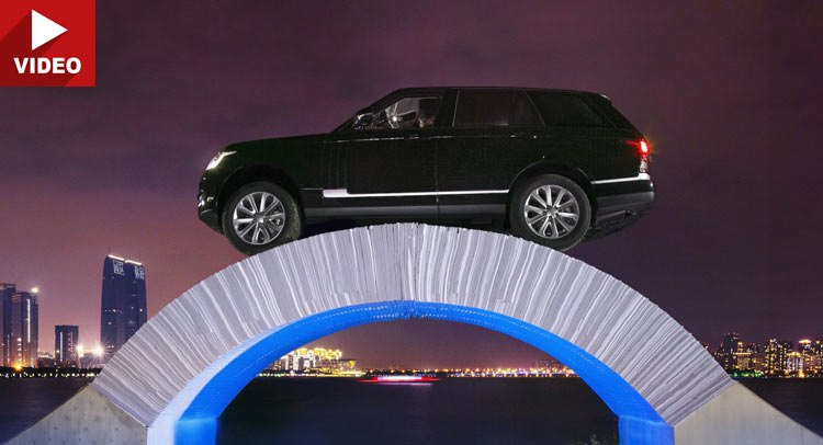  Watch A Range Rover Drive Across A…Paper Bridge