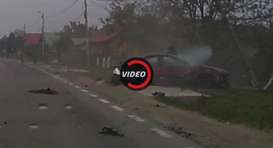  Sedan Skids Across Three Lanes, Smashes Violently Into Fence