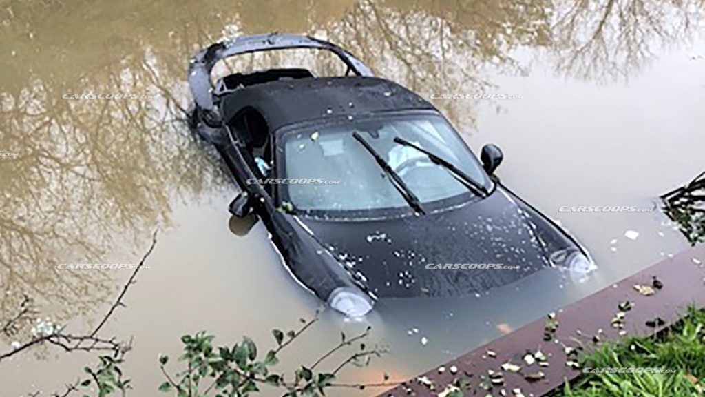  Porsche 911 Loses It On Wet Road, Ends Up Taking A Bath In A Creek