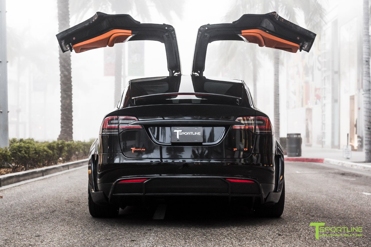 Orange And The All Black Meet T Sportline S Widebody Tesla Model X Carscoops