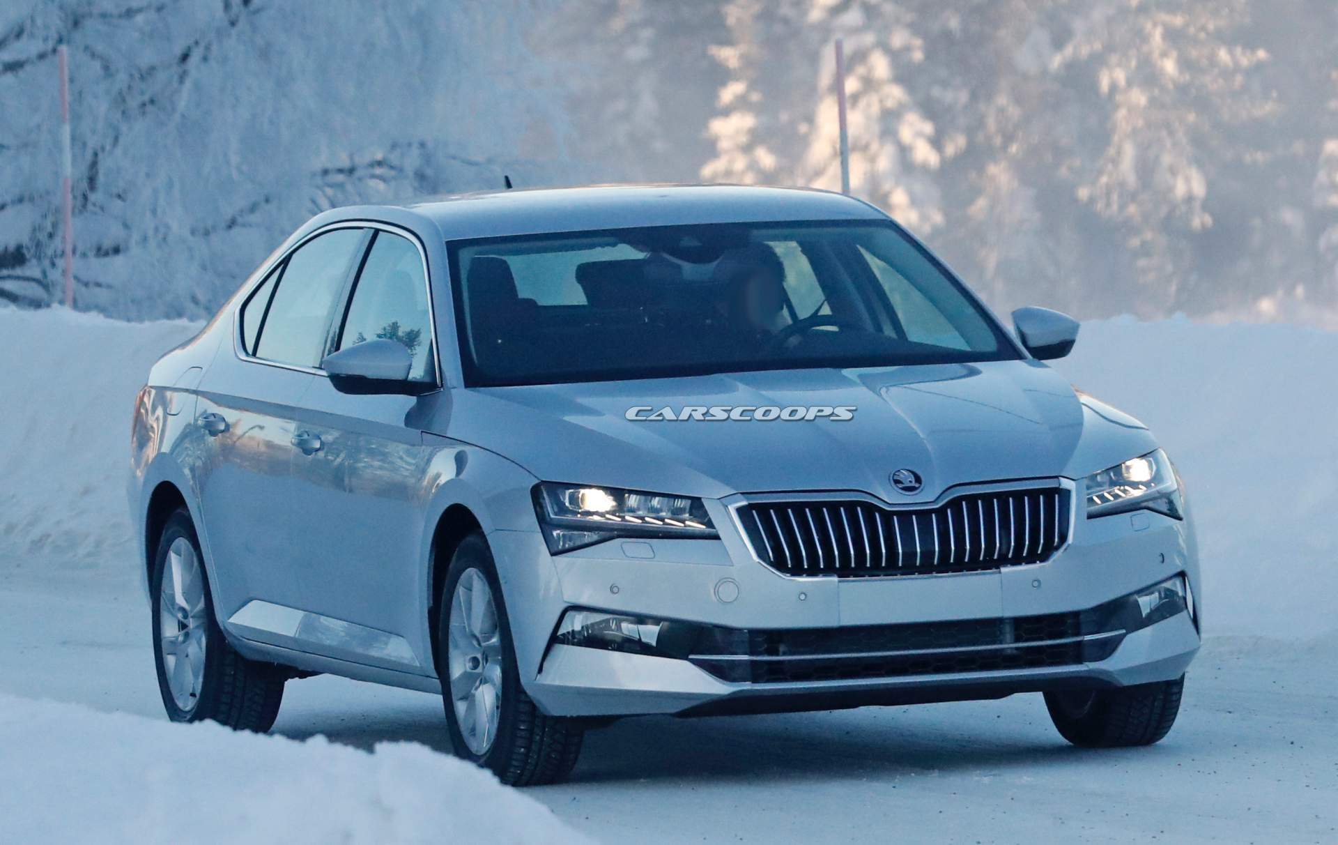 2019 skoda superb practically undisguised as it inches