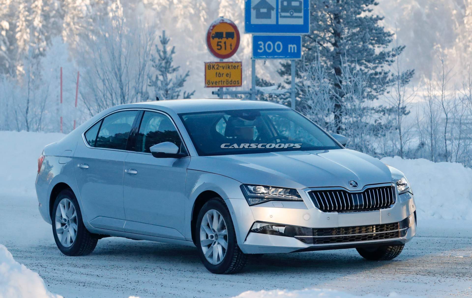 Skoda Superb Winter Forest