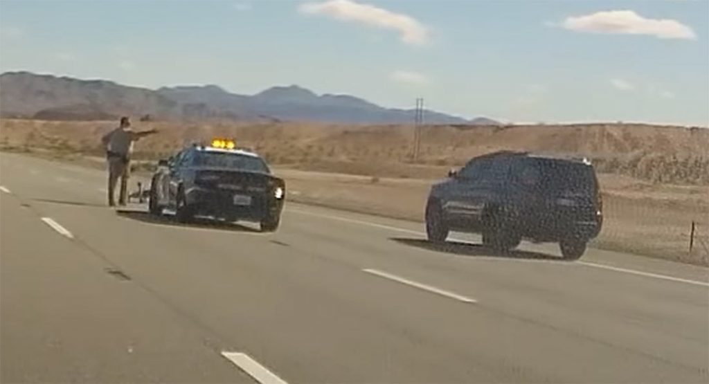  Police Officer Stops California Highway Traffic, SUV Driver Totally Ignores Him