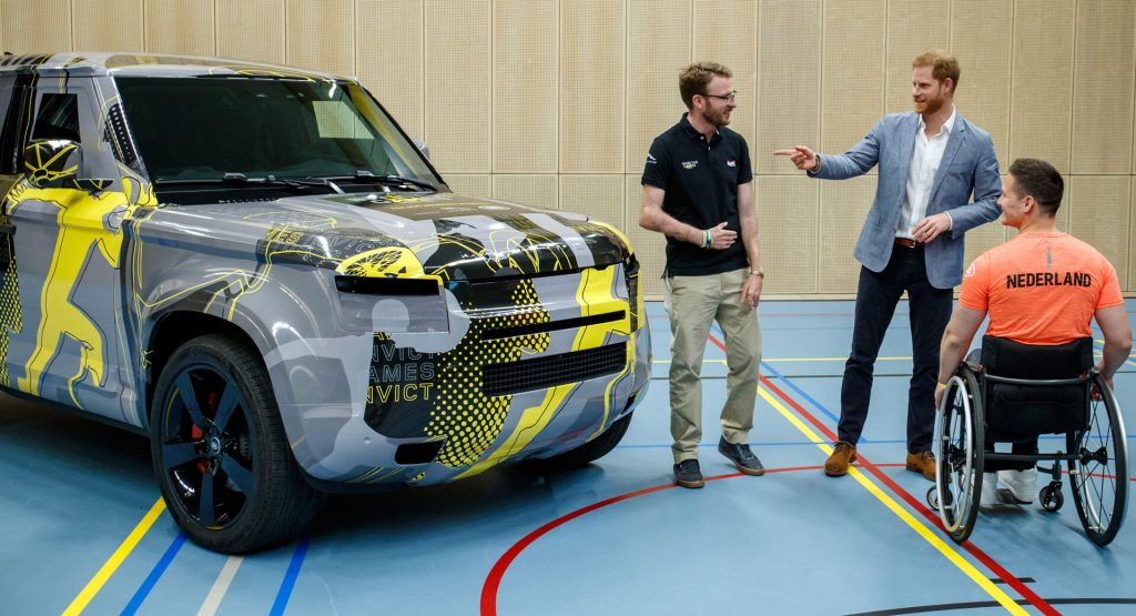  Prince Harry Meets The New Land Rover Defender As SUV Drops More Camo