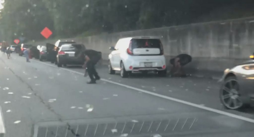  It’s Raining Bucks: Drivers Stop Their Cars, Pick Up Cash Dropped By Armored Truck