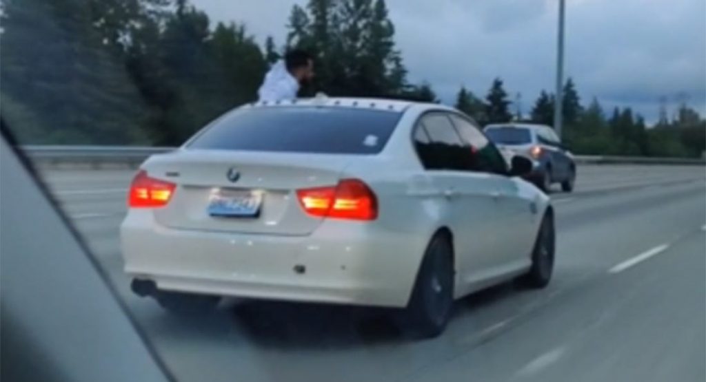  BMW 3-Series Driver Filmed Sitting On The Window While Cruising On The Highway!