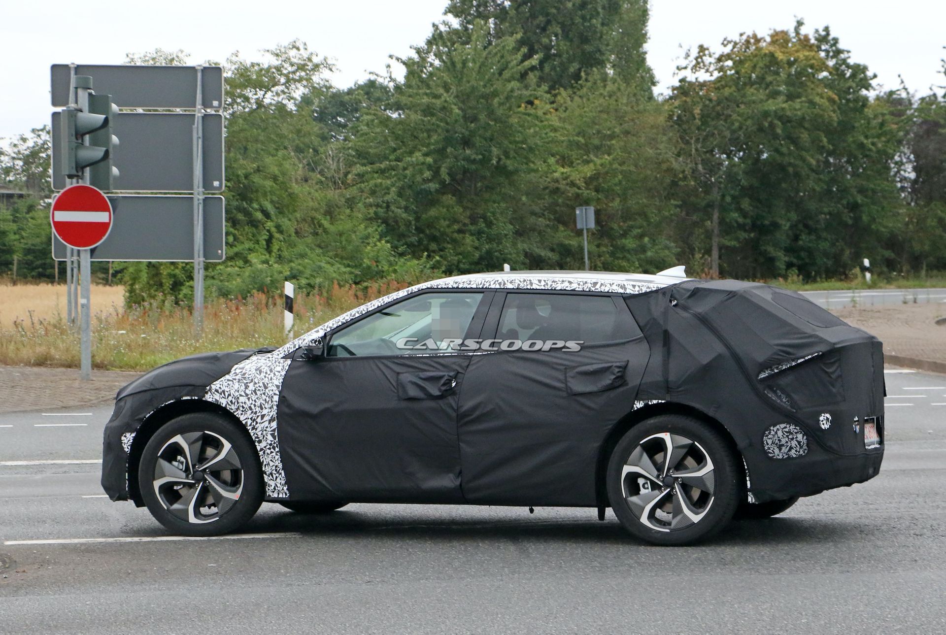 Kia's New EV Makes Spy Debut, Looks Like A Cross Between Imagine And ...