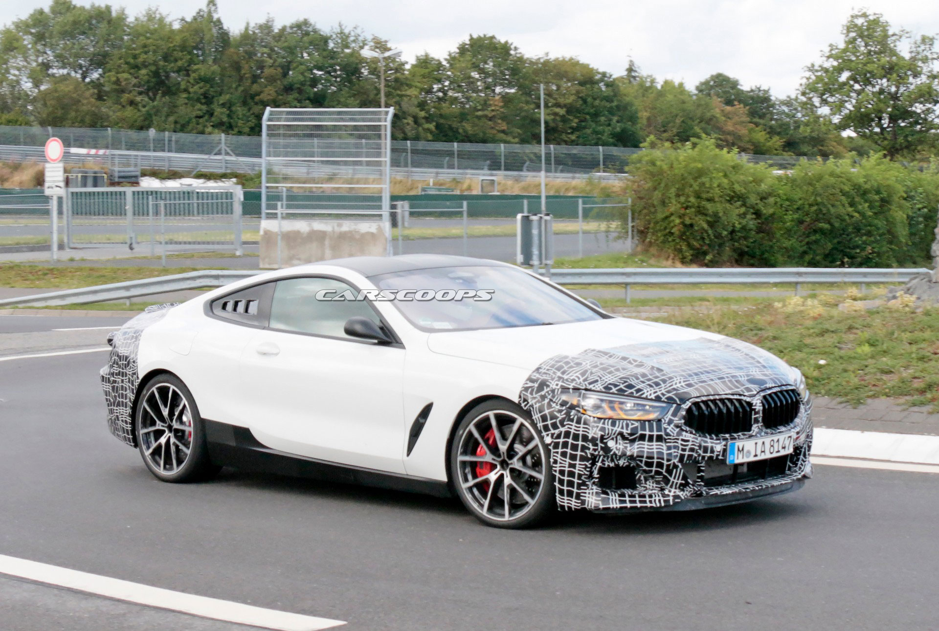 Is This Bmw 8 Series Prototype Hiding A Mid Engine Secret Or Just Trying To Fool Us Carscoops