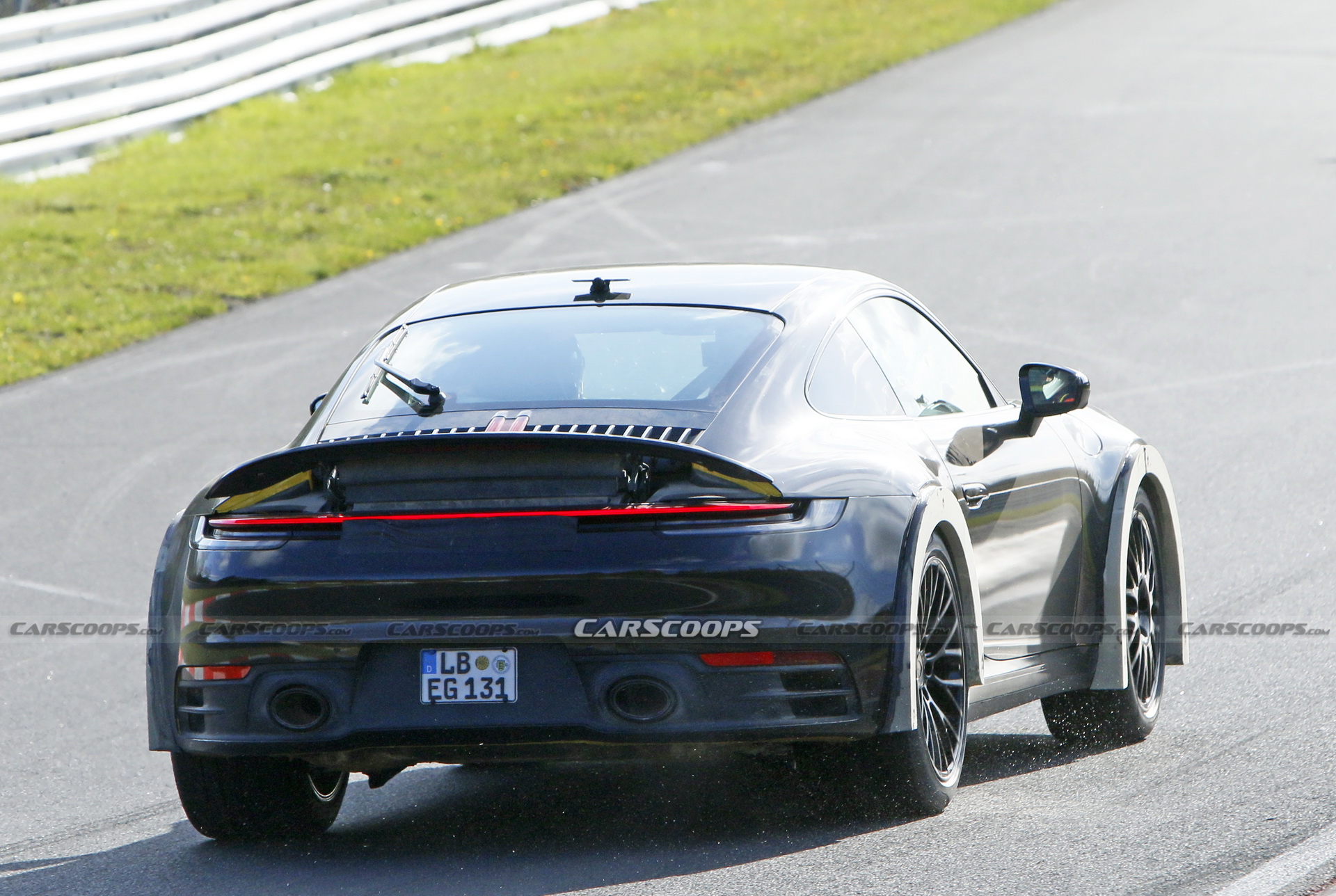 Porsche Spied Testing Weird High-Riding 911 On The Nurburgring | Carscoops