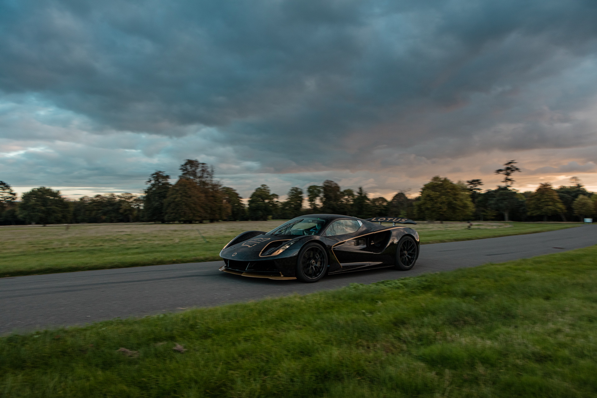 Lotus Evija EV Dresses Up In Famous ‘John Player Special’ Black And ...