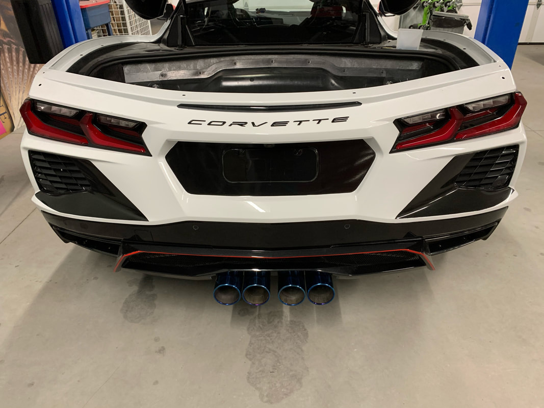 Center Exhausts Of Vettes Past Make A Return On The C8 Corvette Carscoops