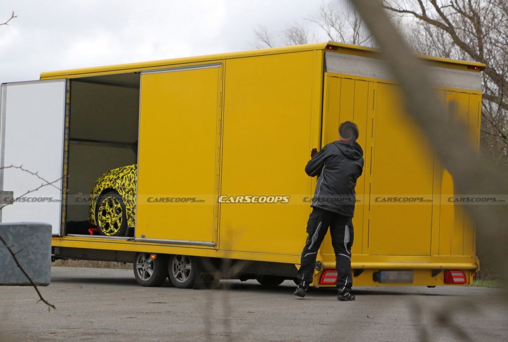 2022 Opel Astra Makes Spy Debut With A Not-So-Subtle Yellow Camo Wrap ...