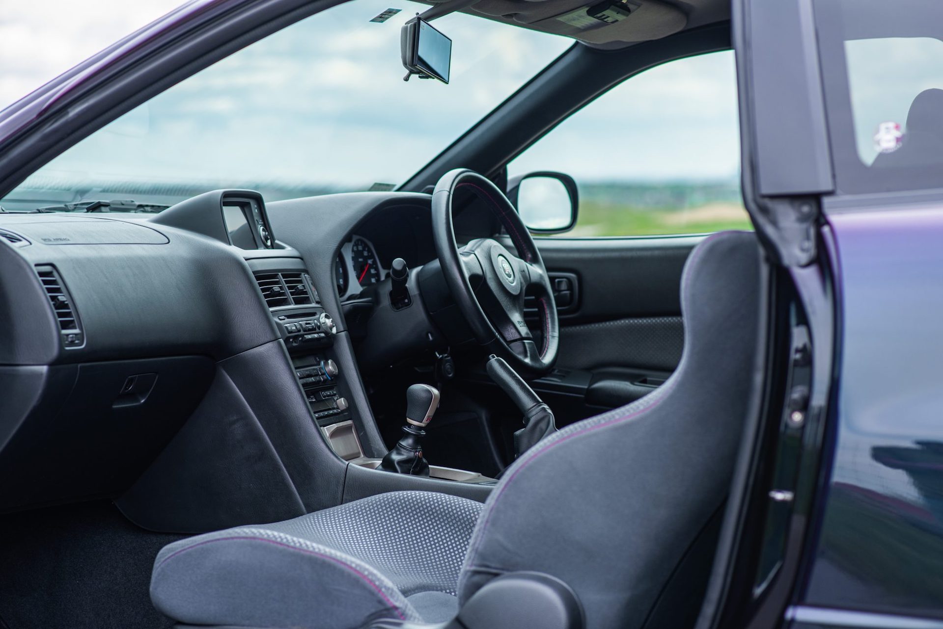 This Midnight Purple Ii 1999 Nissan Skyline Gt R Could Sell For 400k Carscoops