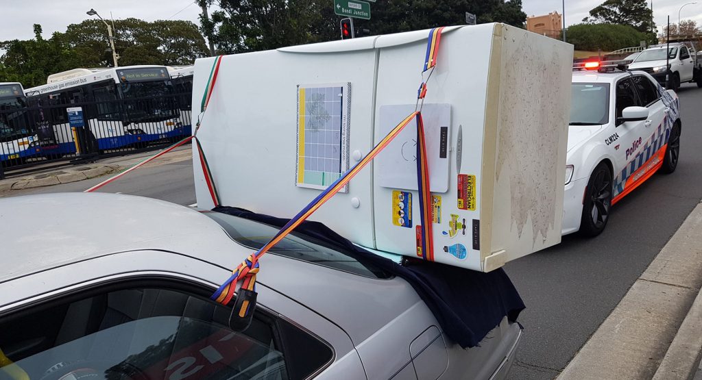  Aussie Tries To Carry Fridge On A Toyota Camry, Police Aren’t Impressed