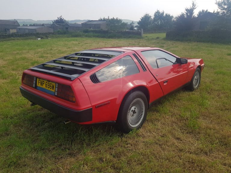 For $37,000, You Can Ride This Rare Red-Painted DeLorean All The Way ...