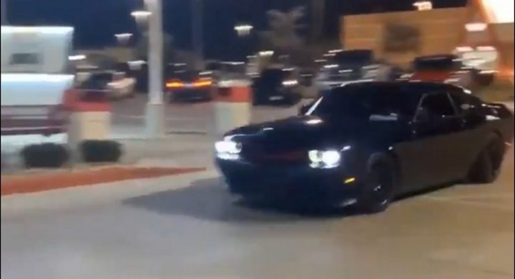  Dodge Challenger Loses Wheel And Hub While Showboating At 70 MPH In A Parking Lot