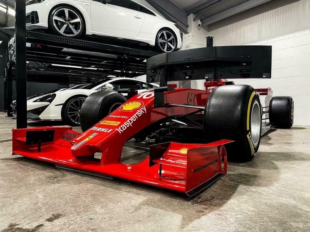 The world's most realistic racing simulator puts Ferrari F1 engineering in  your den for $90,000