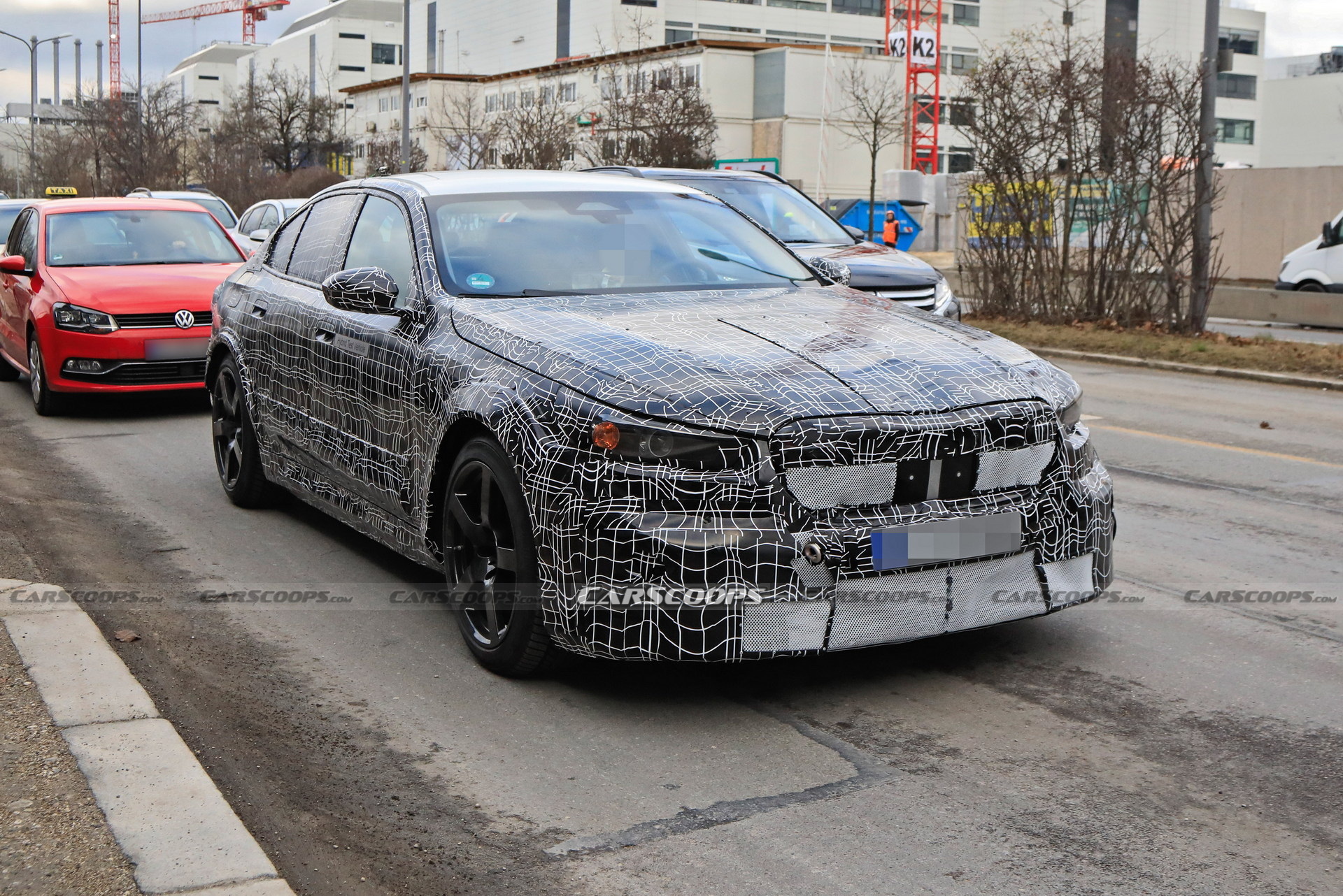 2025 BMW M5 Hybrid Makes Spy Debut Showing Its Aggressive Bodykit ...