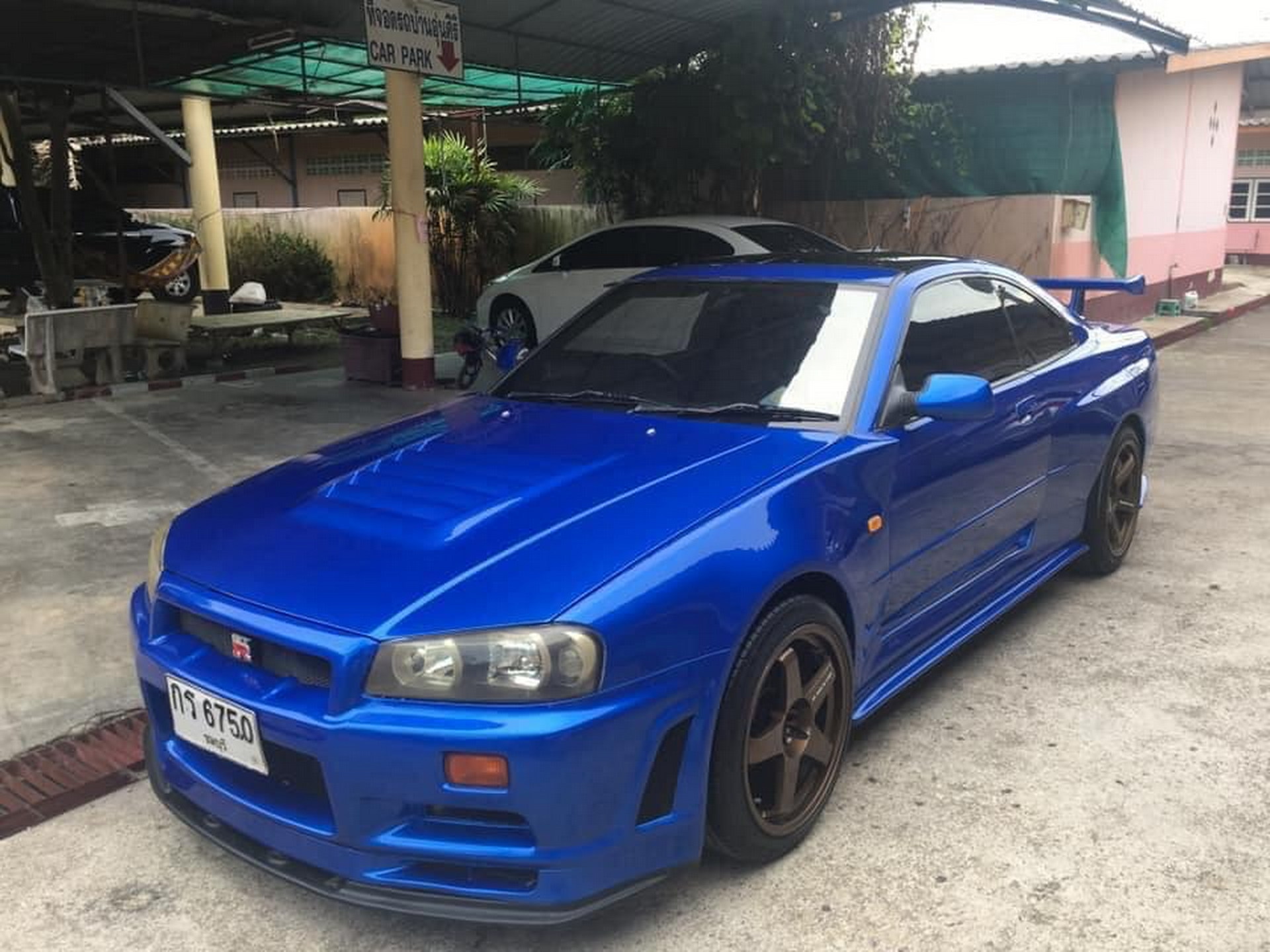 Here S Your 10k Nissan Gt R R34 Replica From Thailand Based On A Rover 0 Coupe Carscoops