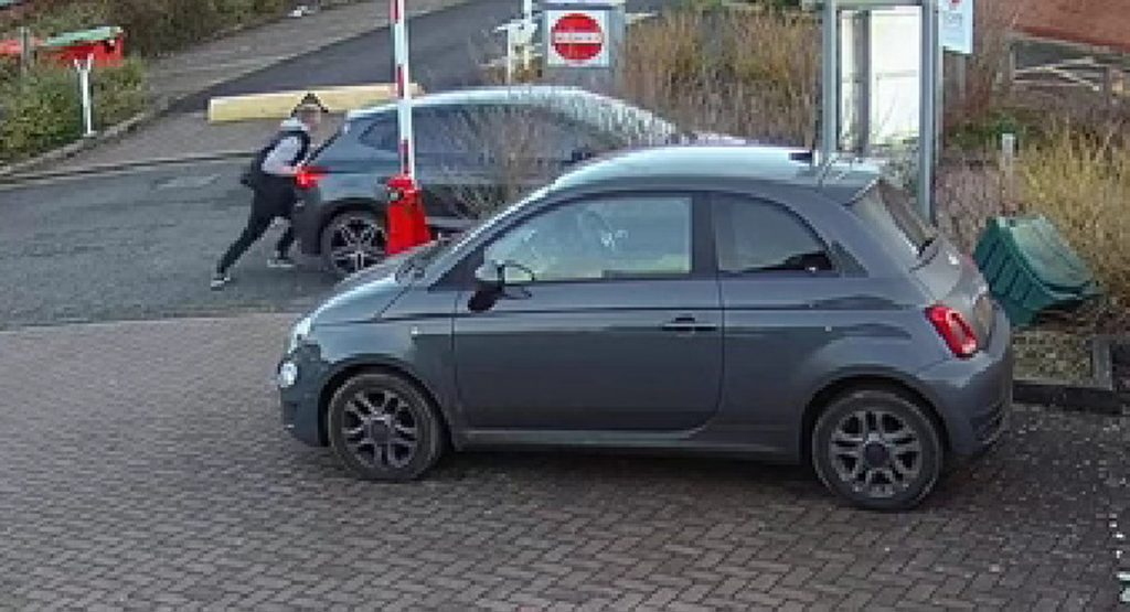  Watch A Guy Somehow Stop A Car From Rolling Into Parked Vehicles