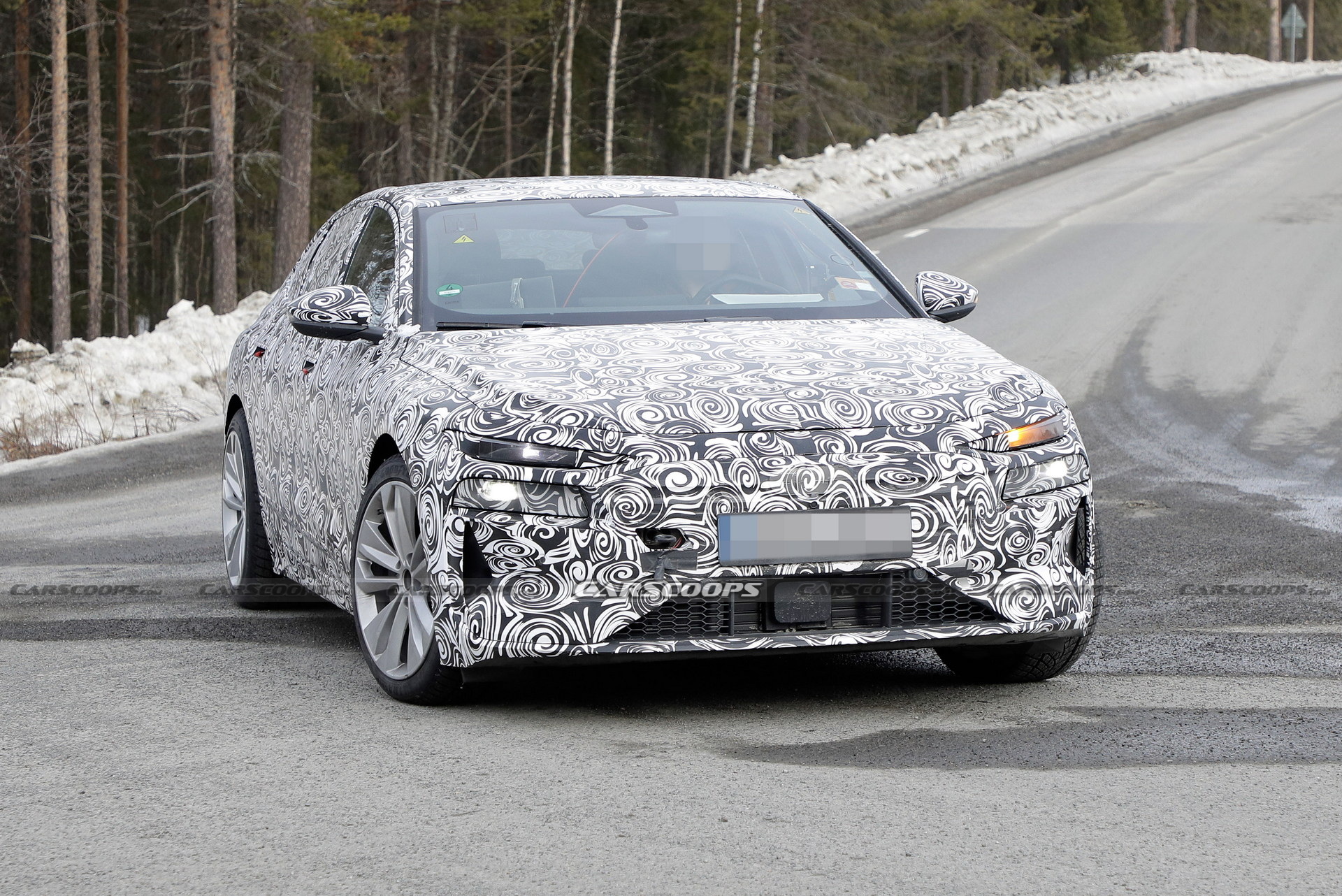 2024 Audi A6 E-Tron Spied Again Showing Split Headlights And Toned-Down ...