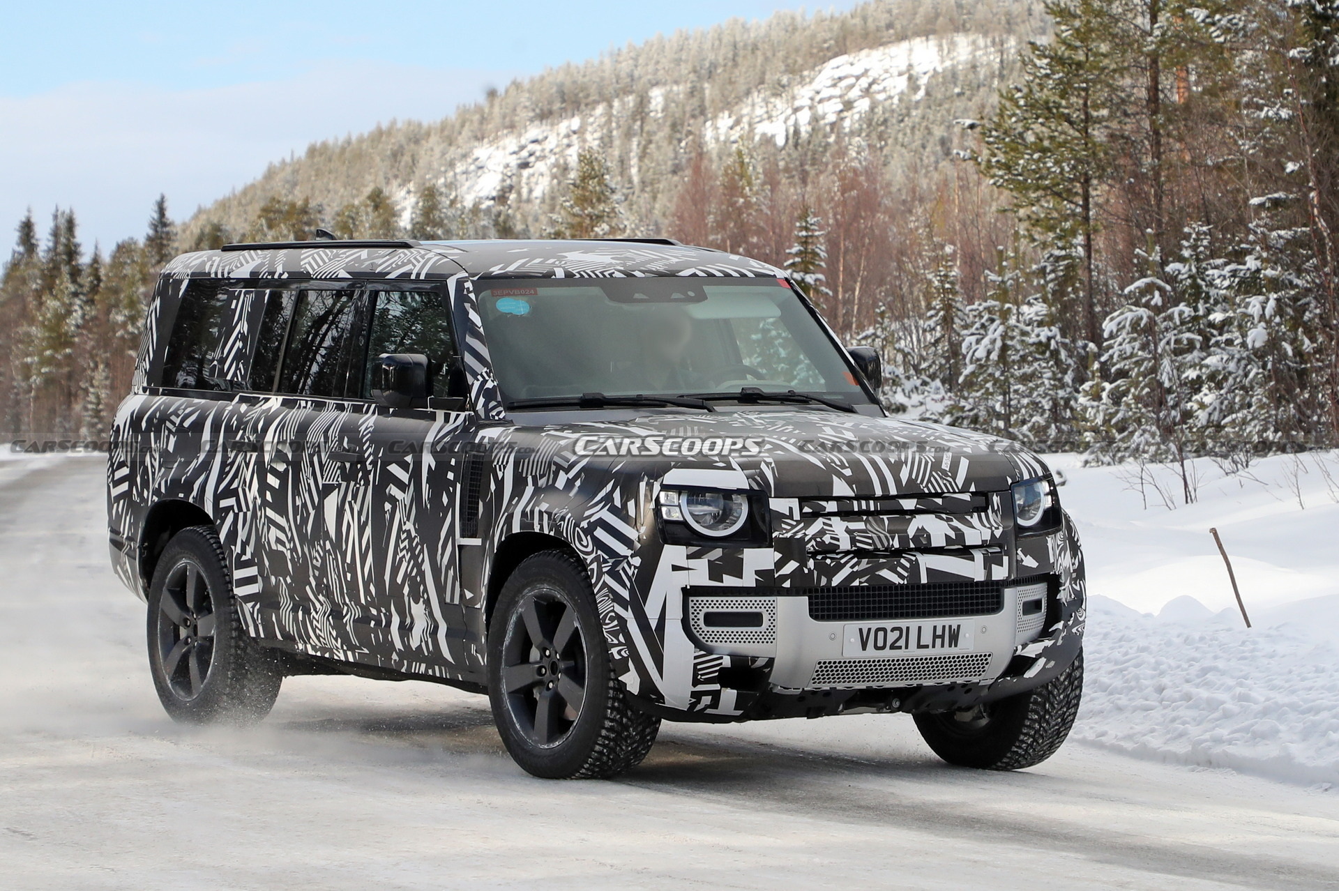 Land Rover’s Longer Defender 130 Spied Testing In The Snow | Carscoops