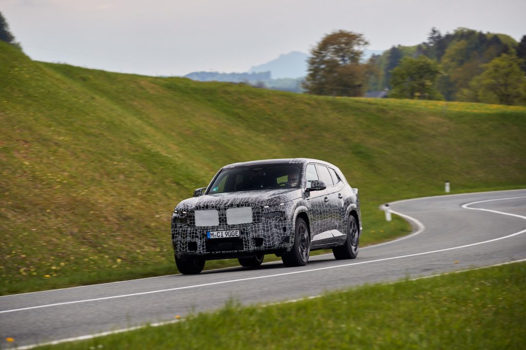 BMW XM Spotted At An Airport With Less Camo, Lots Of Grille | Carscoops