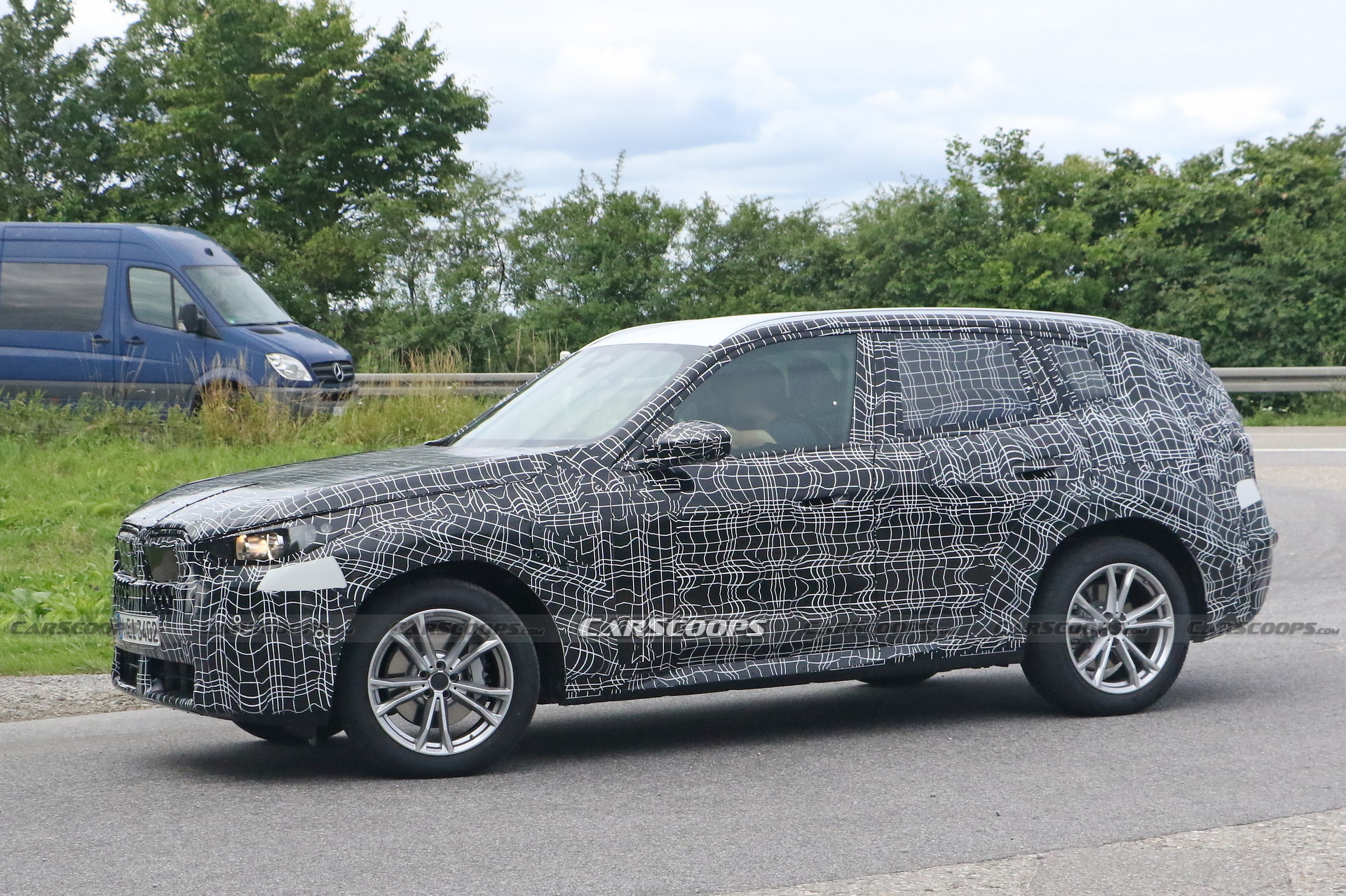 2024 BMW X3 Spied Again Still Wearing Heavy Camouflage Carscoops   2025 BMW X3 Spy Shots 12 