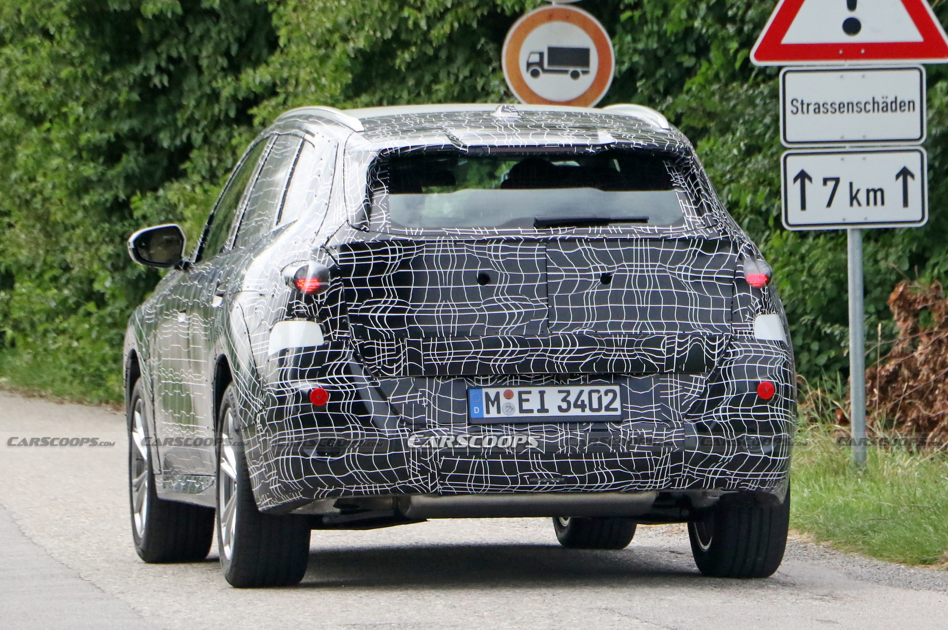 2024 BMW X3 Spied Again Still Wearing Heavy Camouflage Carscoops   2025 BMW X3 Spy Shots 20 