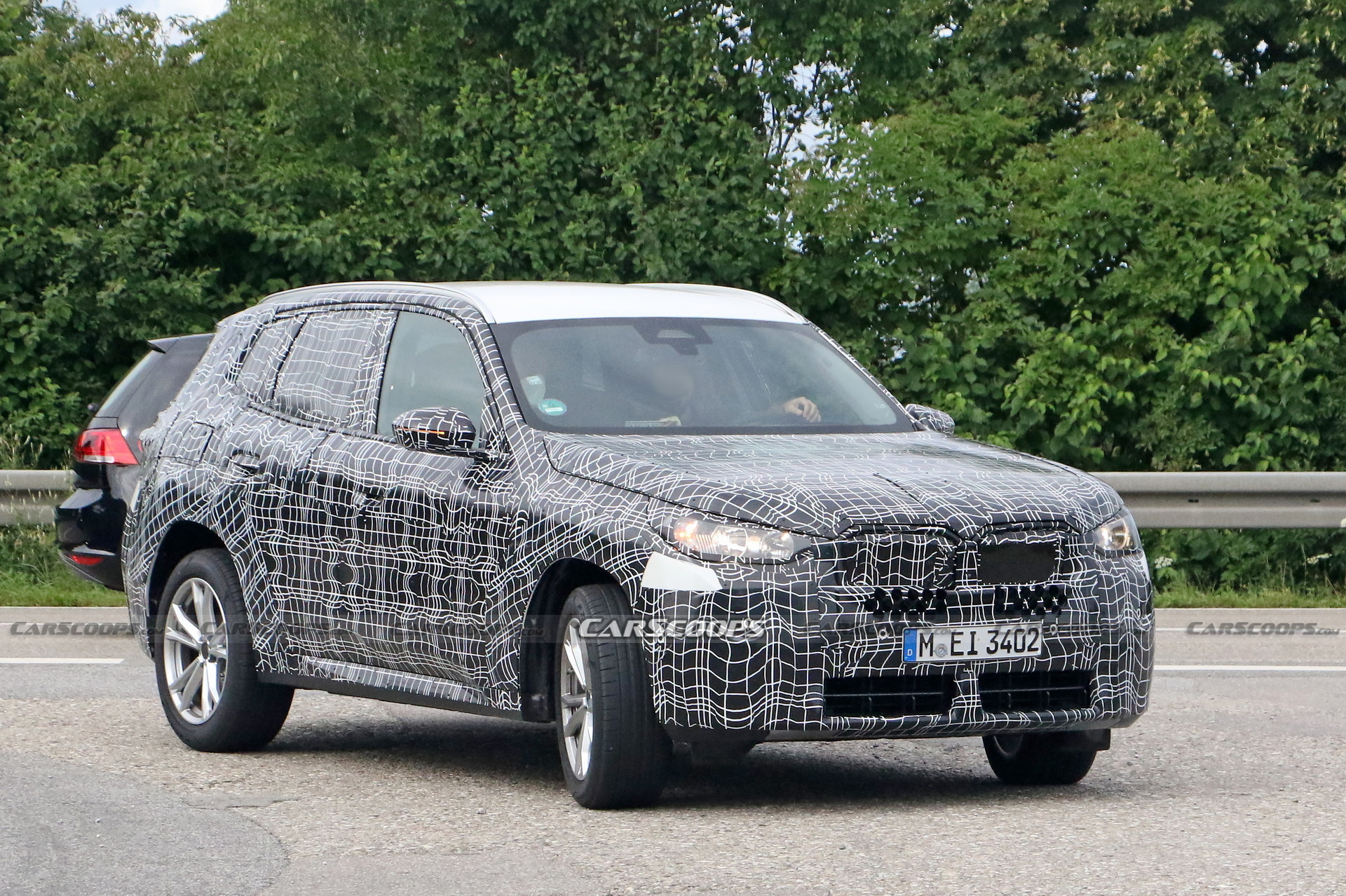 2024 BMW X3 Spied Again Still Wearing Heavy Camouflage Carscoops   2025 BMW X3 Spy Shots 4 