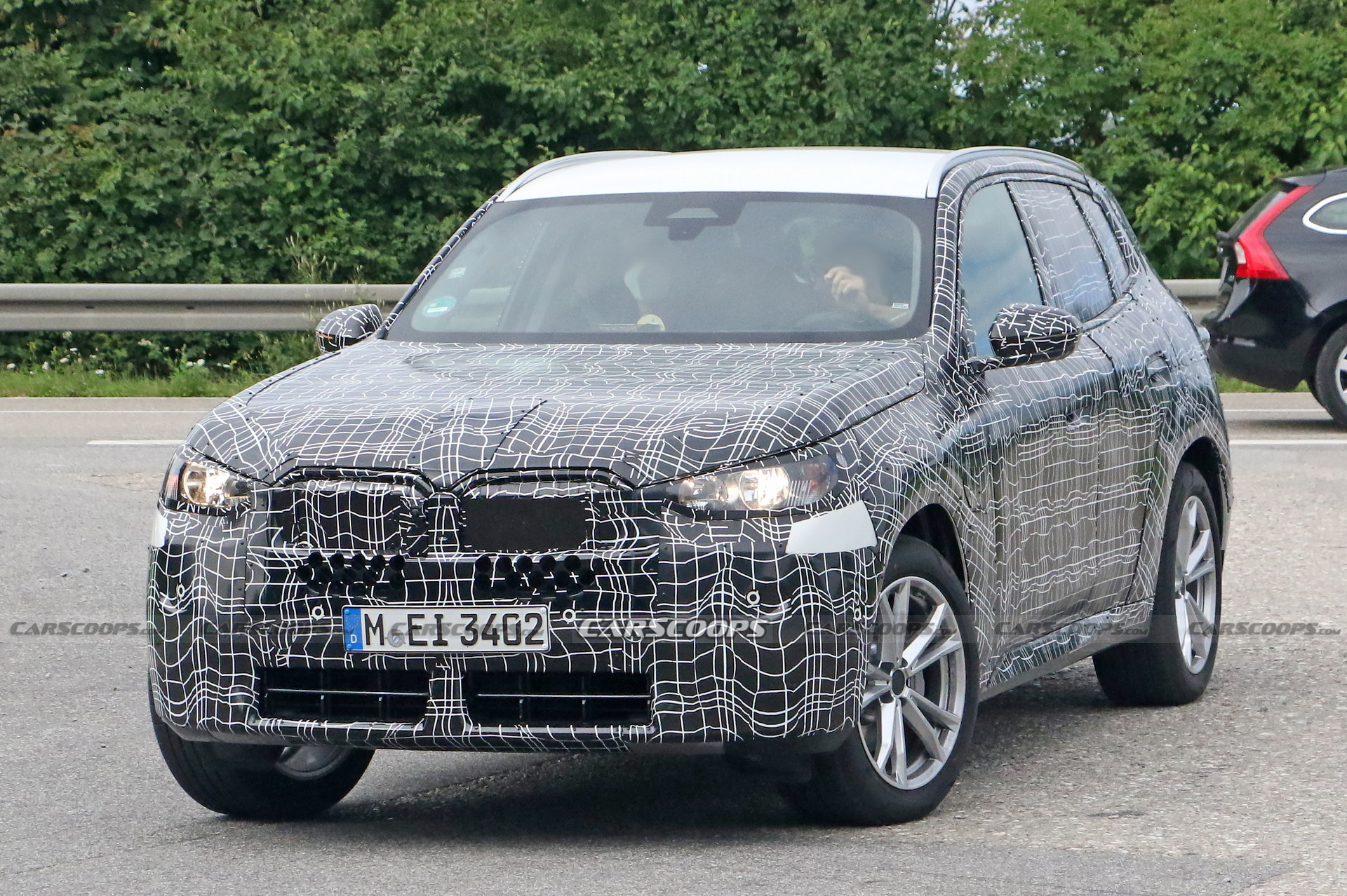 2024 BMW X3 Spied Again Still Wearing Heavy Camouflage Carscoops   2025 BMW X3 Spy Shots 8 