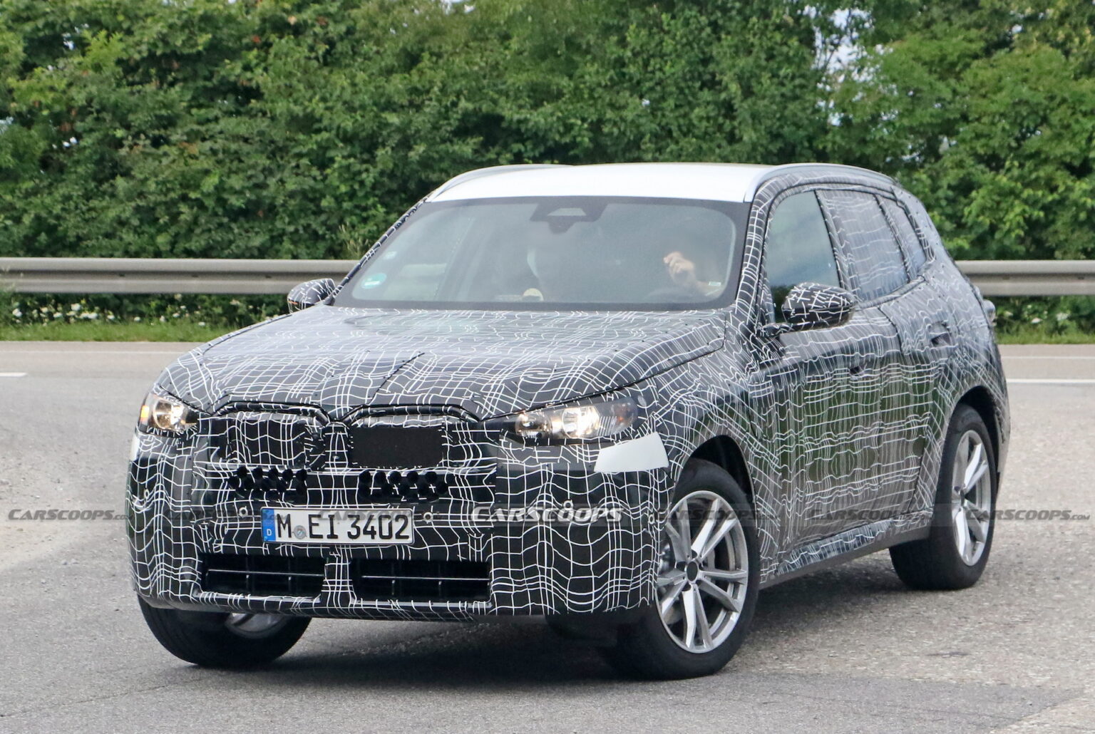 2024 BMW X3 Spied Again Still Wearing Heavy Camouflage | Carscoops