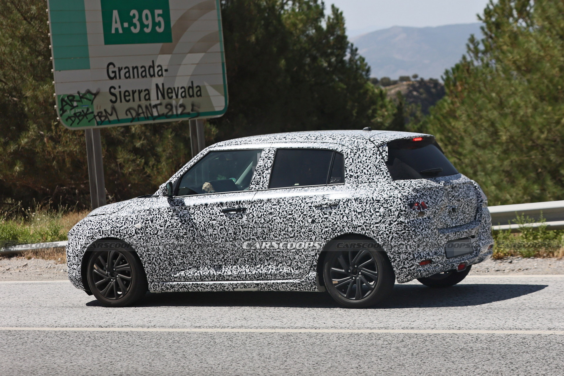 2024 Suzuki Swift Makes Spy Debut Showing Evolutionary Styling | Carscoops