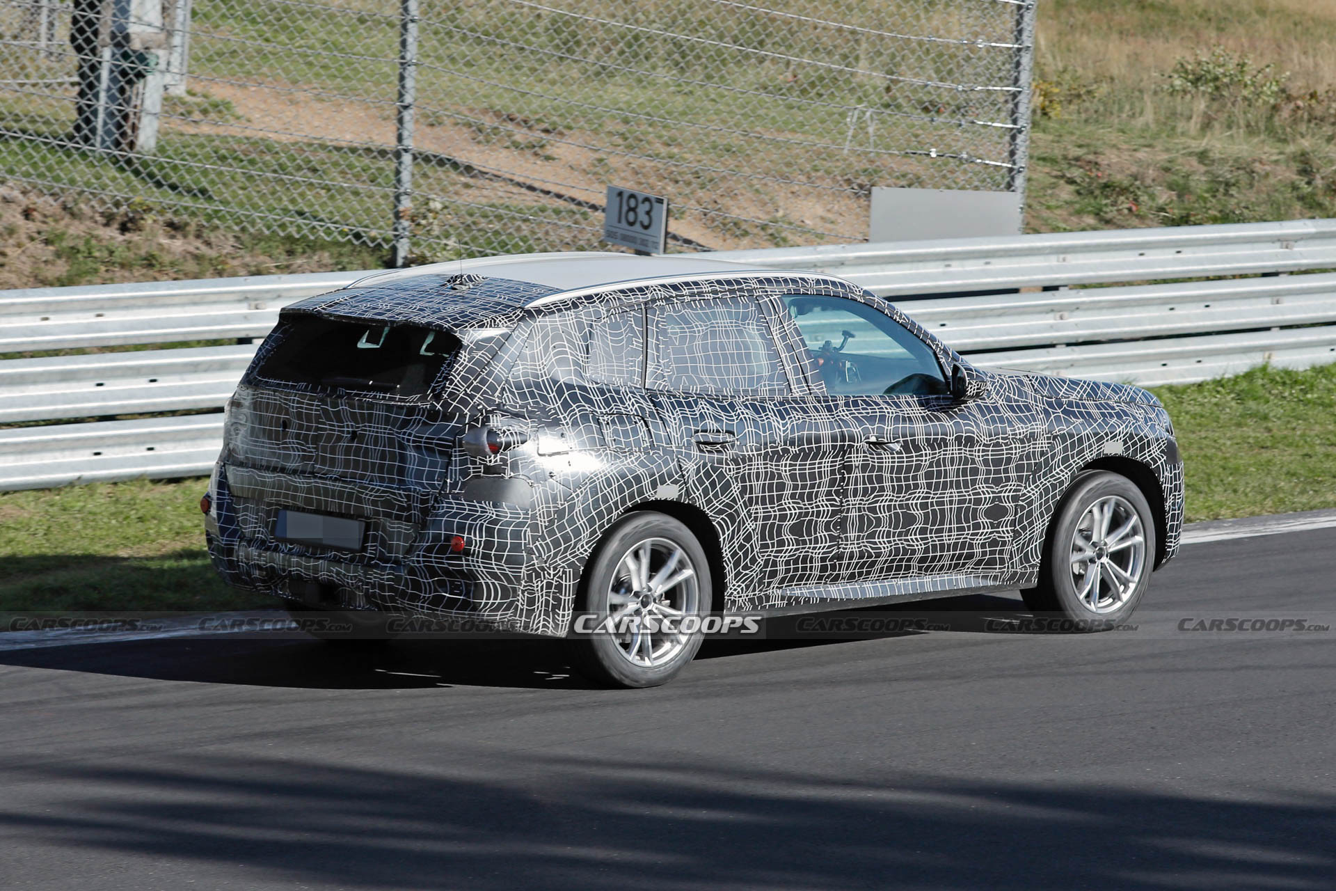 2024 BMW X3M Can’t Hide Its Big Grille Behind Disguise Carscoops