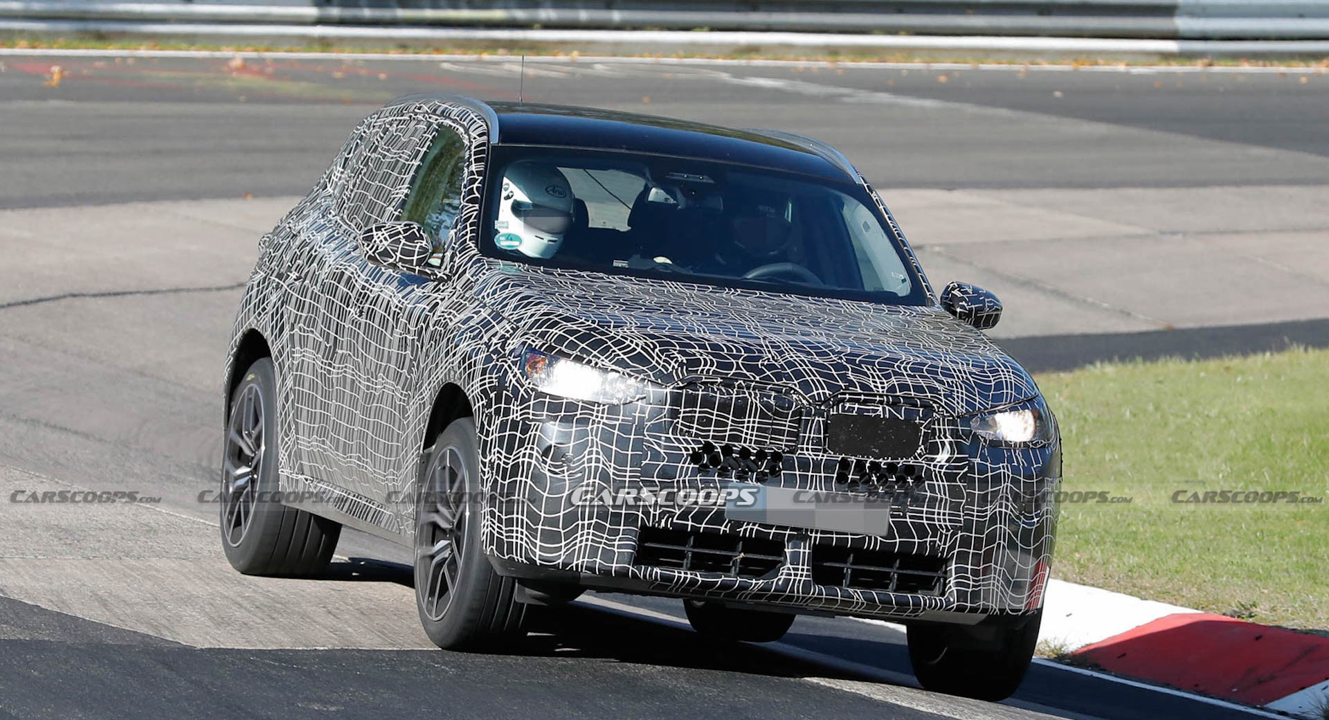 2024 BMW X3M Can’t Hide Its Big Grille Behind Disguise Carscoops