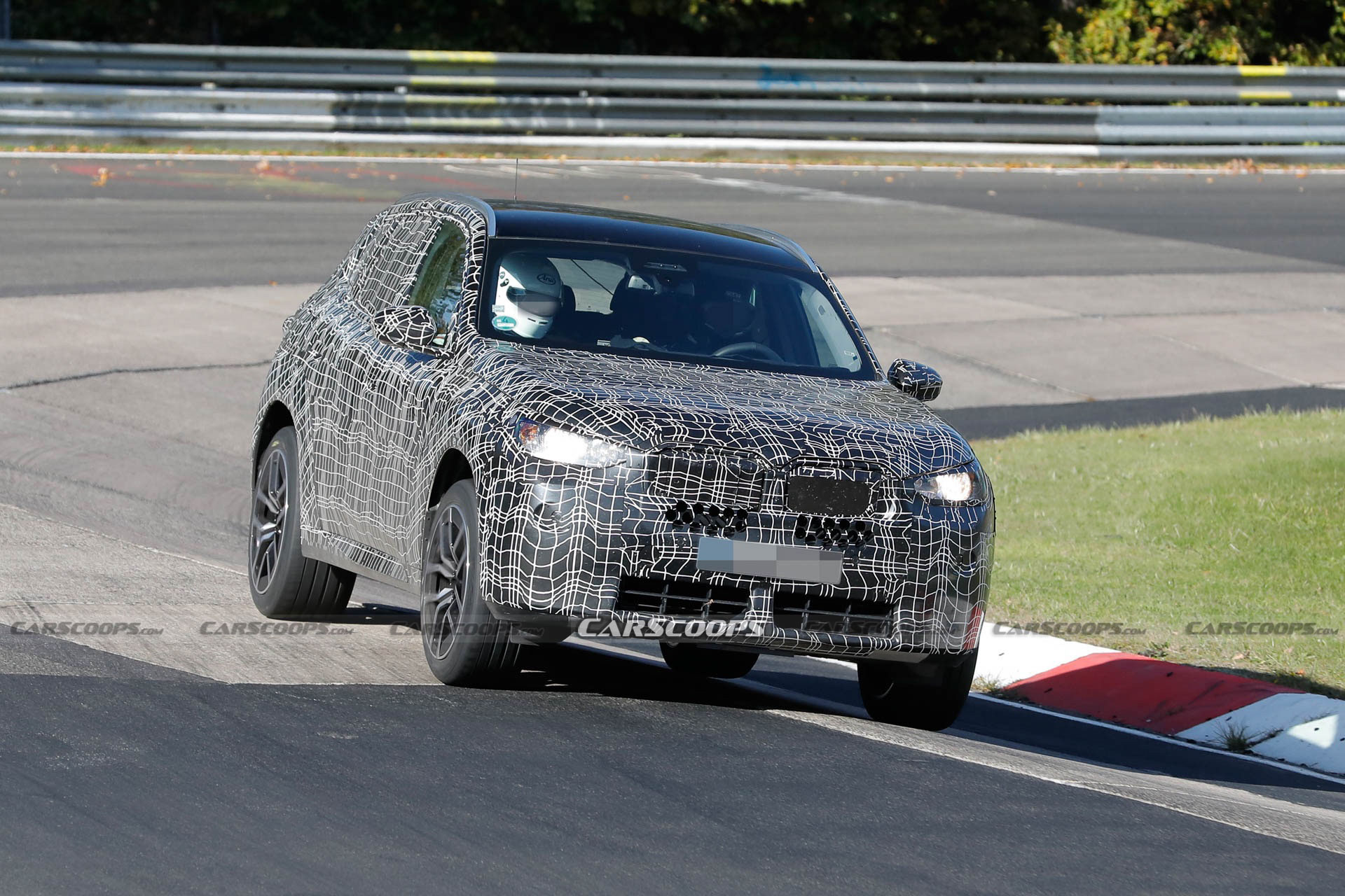 2024 BMW X3M Can’t Hide Its Big Grille Behind Disguise Carscoops