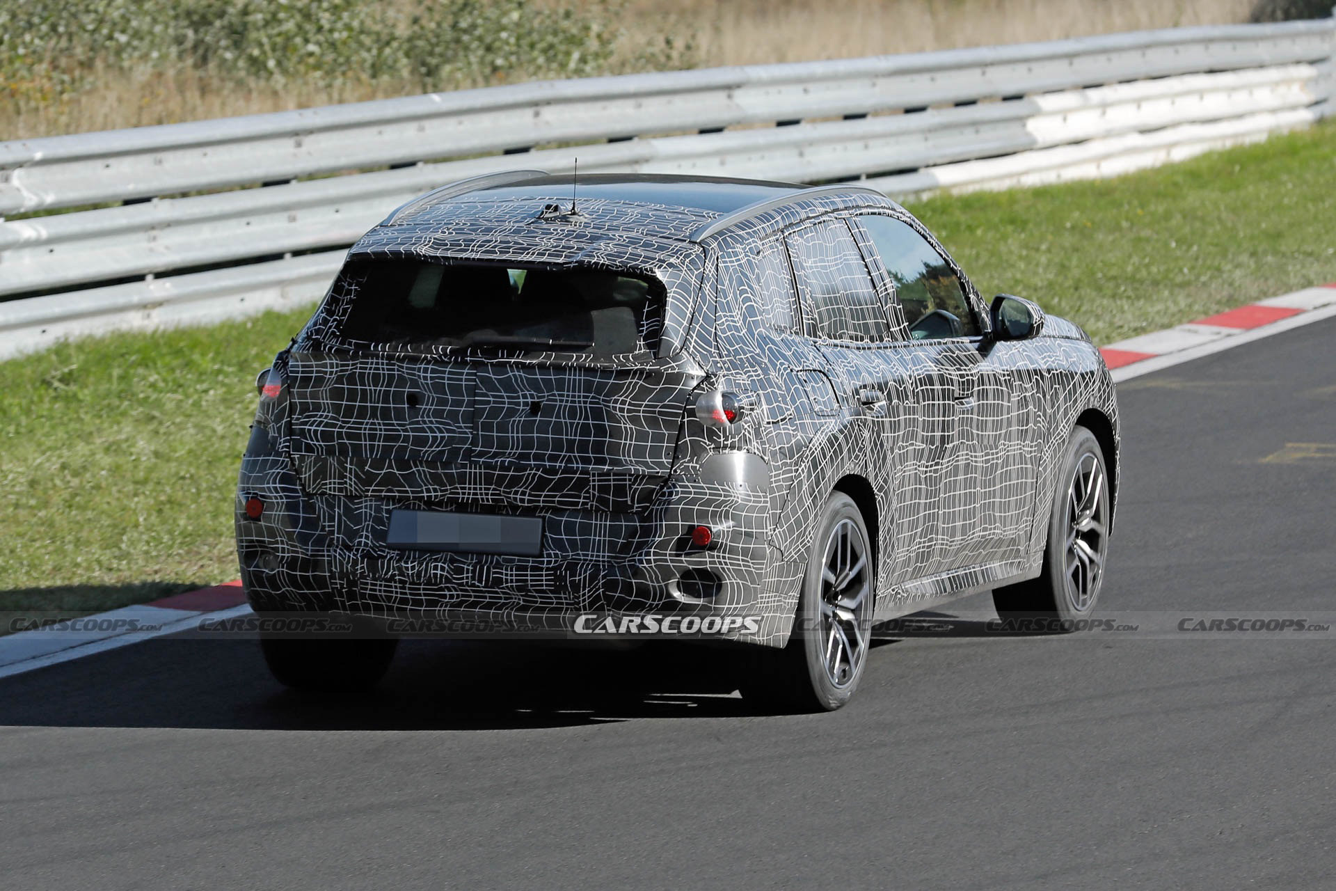 2024 BMW X3M Can’t Hide Its Big Grille Behind Disguise Carscoops